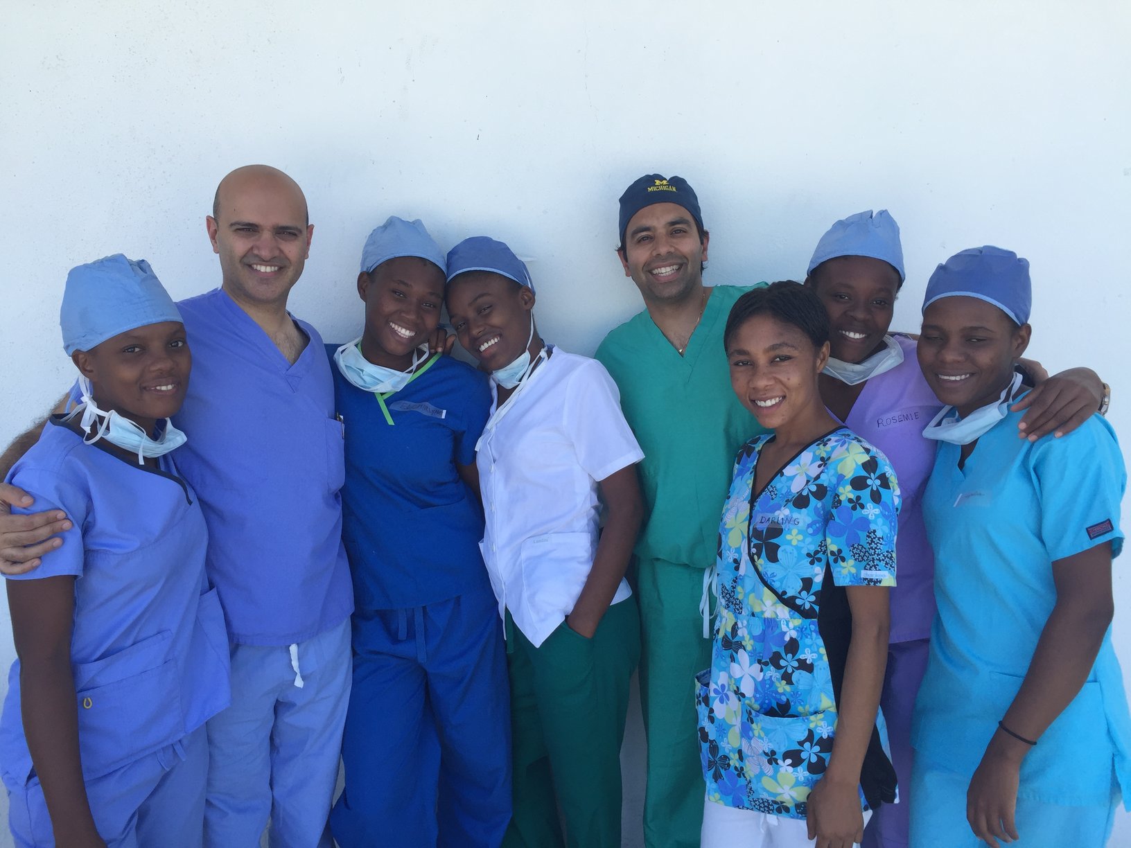 Dr. Vakharia and his surgical scrub nurse team. 